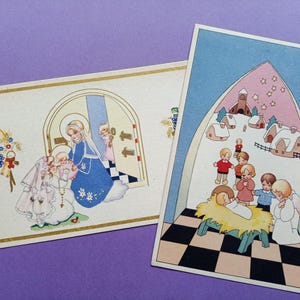 jaren 60,  2 vintage kerst ansichtkaarten, kindje Jezus, engeltjes, maria en jozef, heel schattig, waarschijnlijk van Jeanne Hebbelynck