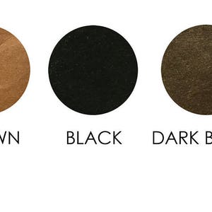 Puede incluir: Tres muestras de color que muestran diferentes tonos de marr&oacute;n. Las muestras est&aacute;n etiquetadas como "Marr&oacute;n", "Negro" y "Marr&oacute;n oscuro".