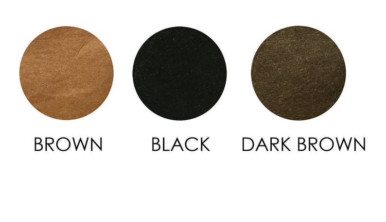 Puede incluir: Tres muestras de color que muestran diferentes tonos de marr&oacute;n. Las muestras est&aacute;n etiquetadas como "Marr&oacute;n", "Negro" y "Marr&oacute;n oscuro".