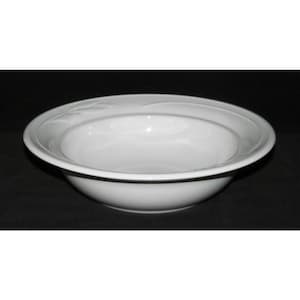 May include: A white ceramic bowl with a wide rim and a shallow interior. The rim features a subtle embossed leaf design. The bowl is set against a dark background, highlighting its clean, simple lines. Ideal for serving soups, salads, or other dishes.