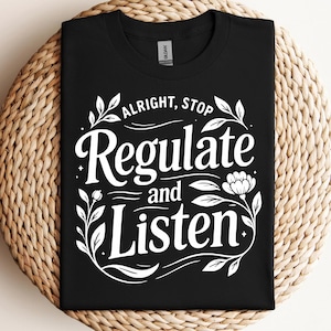 Puede incluir: Camiseta negra con texto blanco y diseño floral. El texto dice "Alright, Stop Regulate and Listen."