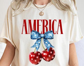 4th of July Bow Coquette Shirt, Cherry Shirt, American Flag Tee, USA Shirt, Independence Day, Womens Shirt, Patriotic Shirt, Red White Blue