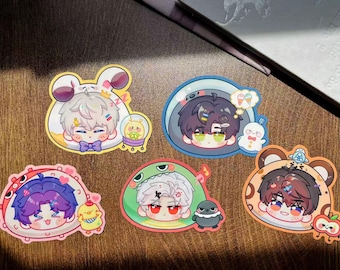 May include: Five die-cut vinyl stickers featuring stylized anime-inspired characters. One character wears a white bunny hood, another is in a blue bubble, one has purple hair with a chick, one wears a green frog hood, and one has brown hair with bear ears.