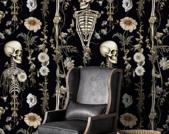 May include: Black wallpaper featuring a repeating pattern of human skeletons, flowers, and vines. The skeletons are depicted in a detailed, anatomical style. The flowers are white and beige, creating a gothic, yet elegant aesthetic. A black leather armchair and a woven basket are in the foreground.