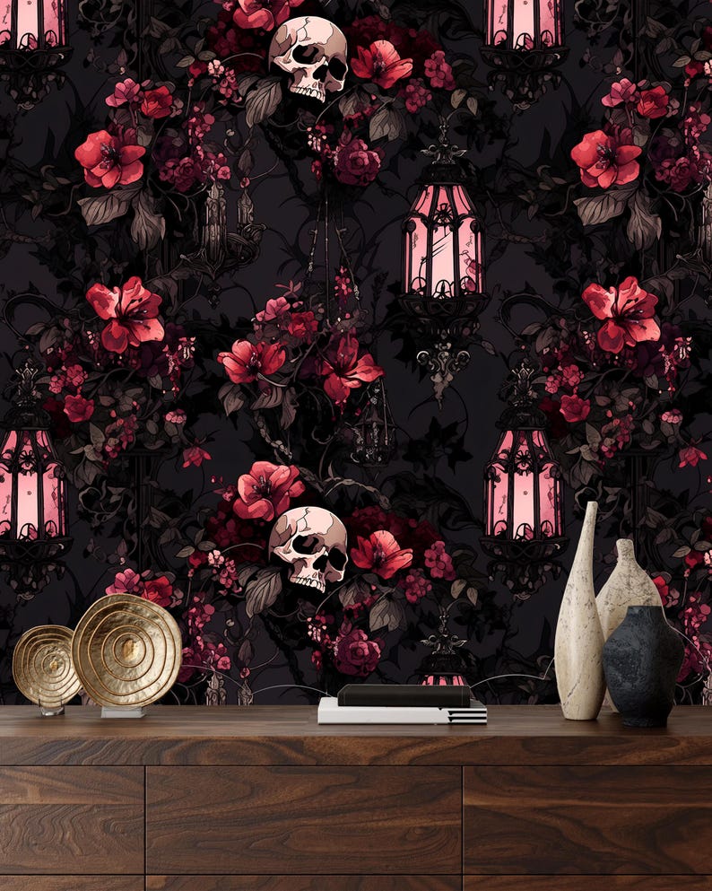 May include: A dark floral wallpaper with a gothic theme featuring skulls, lanterns, and vines. The wallpaper is a dark gray color with pink flowers and black accents.
