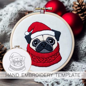 May include: An embroidery hoop features a pug wearing a Santa hat and a red scarf. The pug is embroidered on white fabric. A smaller, black and white line drawing of the pug is in a smaller hoop. The text "HAND EMBROIDERY TEMPLATE" is at the bottom.