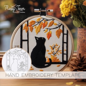 May include: Hand embroidery template featuring a black cat sitting by a window with autumn leaves. The template includes a black cat, a window with a ladder, and autumn leaves in shades of yellow and orange.