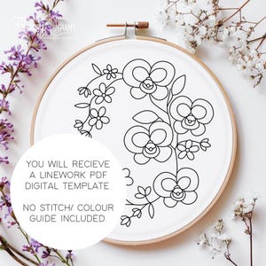 May include: A black and white line drawing of a floral design with orchids and small flowers in a hoop. The text "YOU WILL RECIEVE A LINEWORK PDF DIGITAL TEMPLATE. NO STITCH/ COLOUR GUIDE INCLUDED." is below the hoop.