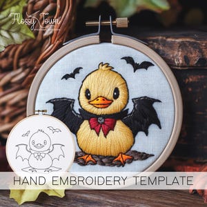 May include: Hand embroidery template featuring a cute yellow duck with black bat wings, wearing a red bow tie. The template is in a hoop and includes a line drawing of the duck for reference.