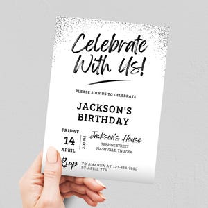 May include: Black and white birthday invitation with silver glitter background. The invitation says "Celebrate With Us!" and includes the details: Jackson's Birthday, Friday, April 14th, 2:00 PM, Jackson's House, 789 Pine Street, Nashville, TN 37206. RSVP to Amanda at 123-456-7890 by April 7th.