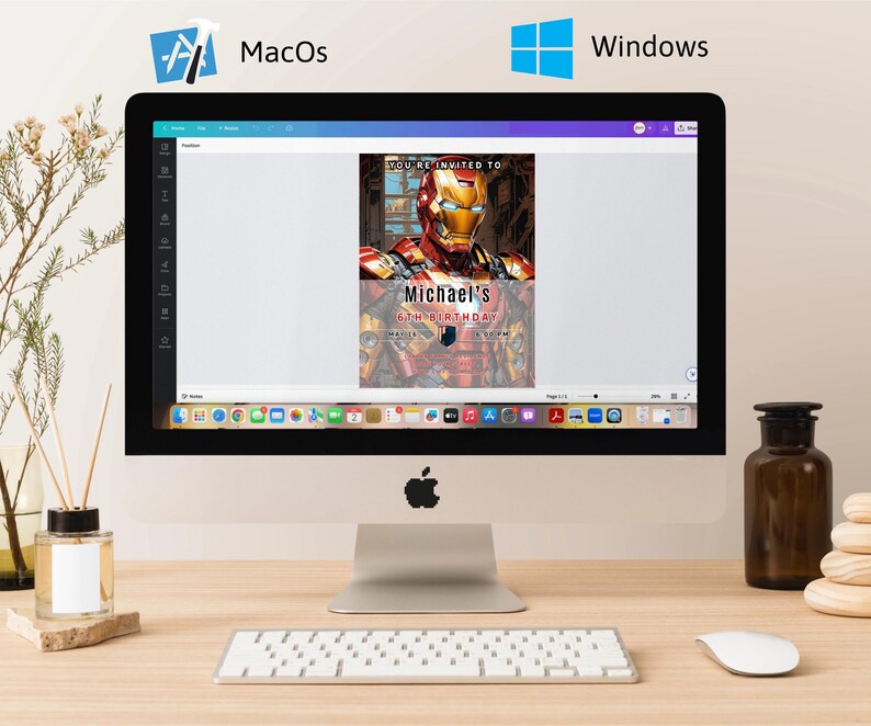 May include: A desktop computer displays a birthday invitation featuring Iron Man. The invitation reads "You're Invited To Michael's 6th Birthday." The computer is on a wooden desk with a keyboard, mouse, and decorative items.