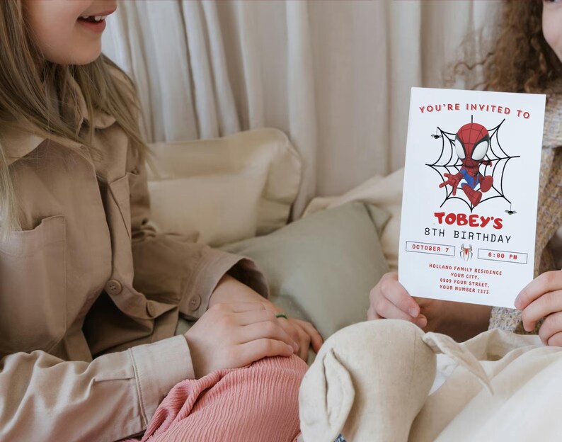 May include: A red and blue Spiderman cartoon character is on a birthday invitation for an 8th birthday party. The invitation says "You're invited to Tobey's 8th Birthday" and includes the date, time, and location of the party.