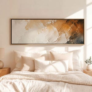 May include: A rectangular wall art piece featuring an abstract landscape with thick, textured impasto paint strokes. The colour palette transitions from creamy white and beige on the left to deep, warm ochre and dark brown tones on the right.