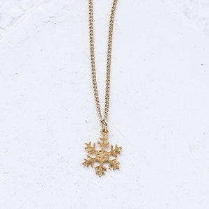 Tiny snowflake necklace clearance
