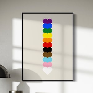 May include: A framed print featuring a vertical line of 11 hearts in various colours, including purple, blue, green, yellow, orange, red, black, brown, light blue, pink, and white.