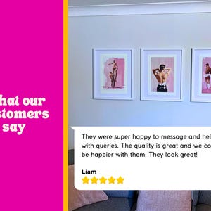 May include: Three framed art prints with white frames on a light grey wall. The prints show pink and white illustrations of figures. A customer review is displayed below the art, with the text "What our customers say."