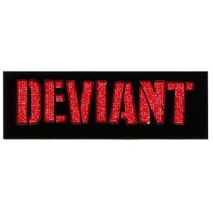 May include: A black rectangular patch with the word "DEVIANT" in red, outlined in white, and made of small squares.