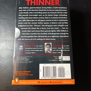 May include: A black and white book cover with the title "Thinner" by Stephen King. The cover features a photo of Stephen King and Joe Mantegna. The book is an audiobook with a running time of 12 hours on 8 cassettes.