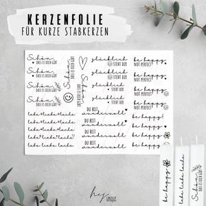 Könnte beinhalten: Eine Bogen mit Kerzenaufklebern mit verschiedenen Sprüchen und Designs, darunter "Schön, dass es dich gibt", "glücklich steht dir", "be happy, not perfect", "du bist wundervoll" und "lebe liebe lache".