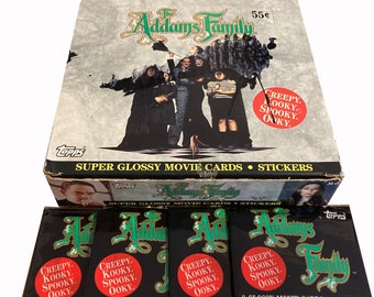 4 packs of The Addams Family vintage trading cards. Each pack contains 8 super glossy movie cards and 1 sticker. Creepy. Kooky. Spooky. Ooky