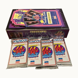 4 paquetes de cromos oficiales de Hollywood. 12 cromos por paquete. ¡Colecciona todos tus favoritos del Paseo de la Fama de Hollywood! Starline 1991.