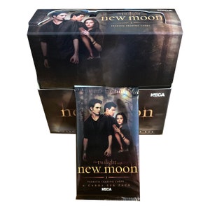 1 pack of Twilight New Moon vintage premium trading cards. 6 cards per pack. Collect them all! Robert Pattinson Kristen Stewart vampires!