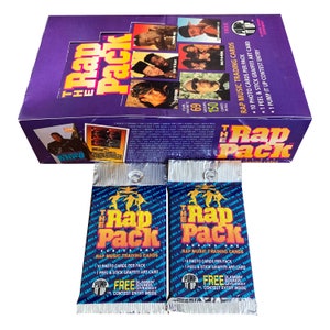 2 paquets de cartes à collectionner vintage The Rap Pack. 10 cartes + 1 carte de graffiti par paquet. Collectionnez les 150 ! Premier Cards 1991. Ice-T NWA plus !