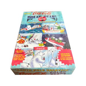 Factory sealed box of The Coca-Cola Polar Bears in "South Pole Vacation" vintage trading cards. 36 packs of 8 cards. Collect-A-Card 1996.