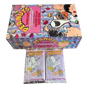 2 packs of Peanuts vintage pogs. 5 caps + 1 slammer per pack. Collect all 60 caps and 12 slammers. 1995. Charlie Brown Snoopy Linus more!