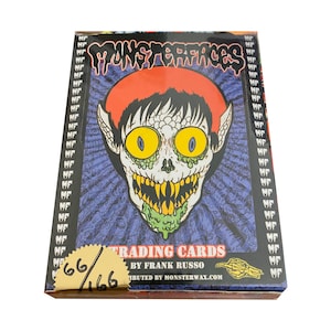 Monstergesichter von Frank Russo. Box #66 von 166. Enthält 24 Packungen. 1 handsignierte Skizzenkarte pro Box. Herausgegeben von MF Gallery in den frühen 2000er Jahren