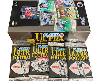 4 packs of 1991 Fleer Ultra Football cards. 14 cards per pack. Lots of classic NFL stars! Fleer 1991. Collect them all!