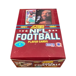 Caixa cheia de cards Score NFL Football de 1991. Série 1. 36 pacotes, 16 cards de jogadores por pacote. Muitas estrelas clássicas da NFL! Colecione todos eles!