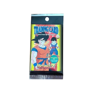 1 pack of Dragon Ball Z Series 1 vintage trading cards. 9 cards + 1 gold metallic card per pack. Collect them all! Artbox 1998. Very scarce!