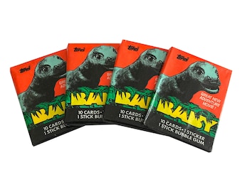 恐竜襲来! トレーディング カード 4 パック。各パックにはカード 5 枚