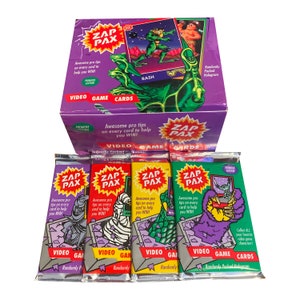 "4 Packungen von ""Zap Pax"" Sammelkarten." 8 Karten pro Packung. Sammle alle 110! Tolle Profi-Tipps auf jeder Karte helfen dir zu gewinnen! 1992.