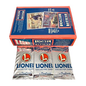 May include: A box of Lionel Legendary Trains Collector Cards with three packs in front. The box is blue and orange with the words "Lionel Trains" and "Collector Cards" printed on it. The packs are silver with the Lionel logo and the words "Collector Card" printed on them.