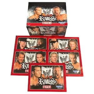 5 packs of WWE Rivals vintage collectable wrestling stickers. Classic WWF/WWE wrestling stars! Collect them all! Produced by Topps Europe.