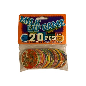 1 package of Milk Cap Game assortment of 20 vintage pogs. Released by Handy Boy Inc. in 1995.