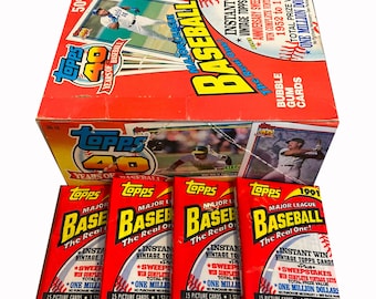 4 packs of 1991 Topps vintage MLB Baseball cards. 15 picture cards per pack. Collect them all! Topps 1991.