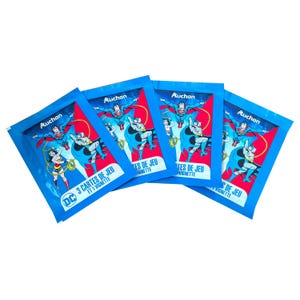 4 packs of DC Comics vintage collectable game cards. 3 cards + 1 sticker per pack. Collect them all! Made in France by Auchan. French text.
