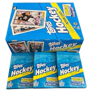 1992 Topps NHL ホッケー ビンテージ ピクチャー カード 3 パック。1 パックあたり ToppsGold カード 1 枚を含む 15 枚のカード。Topps 1992。すべて集めましょう!
