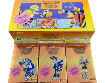 3 packs of Hockey Freaks vintage trading cards. Official 2034-35 Atomic Hockey League cards. 10 teams competing for the Studebaker Cup! 1992