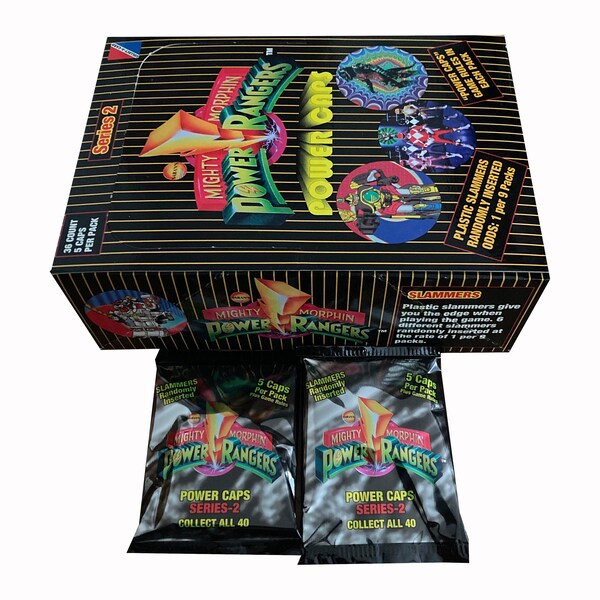 2 packs of Mighty Morphin Power Rangers Power Caps s2 vintage pogs. 5 milk caps per pack. Randomly inserted slammers. Collect-A-Card 1995.
