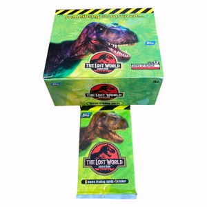1 pak vintage Jurassic Park The Lost World-ruilkaarten. 6 filmruilkaarten + 1 sticker per verpakking. Topps 1997. Moeilijk te vinden!