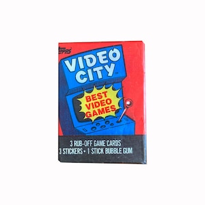 Pack de cire vintage City. 3 cartes de jeu détachables + 3 autocollants. Les meilleurs jeux vidéo ! Topps 1983.