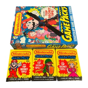 1 paquet de cartes de jeu et d'autocollants vintage à gratter Nintendo Game Packs. Vous choisissez le style d'emballage. Mario, Link, la princesse Peach. Topps 1989.