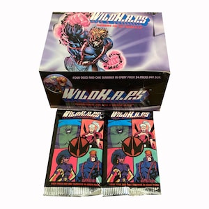2 Packungen WildK.A.P.S. Vintage Pogs mit Jim Lees WildC.A.T.S. 4 Milchverschlüsse und 1 Slammer pro Packung. Sammel alle 54! Oberdeck 1994.