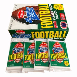 4 paquets de cartes de football Fleer 1990. Première édition. 15 cartes par paquet. De nombreuses stars classiques de la NFL ! Fleer 1990.