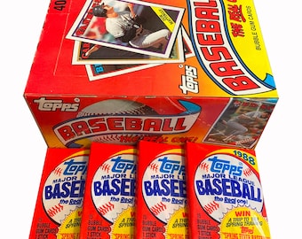 4 packs of 1988 Topps Baseball cards. 15 picture cards per vintage wax pack. Collect them all! Topps 1988. Don Mattingly? Wade Boggs? MLB