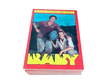Baby complete set of 66 vintage movie trading cards and 11 stickers in excellent condition. Topps 1985. Horrible movie, great cards!